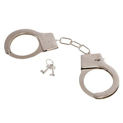 Kovové pouta policie - želízka - vězeň - trestanec - zločinec